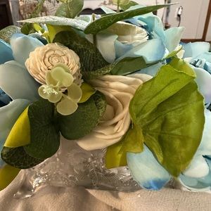 Flower arrangement in glass bowl